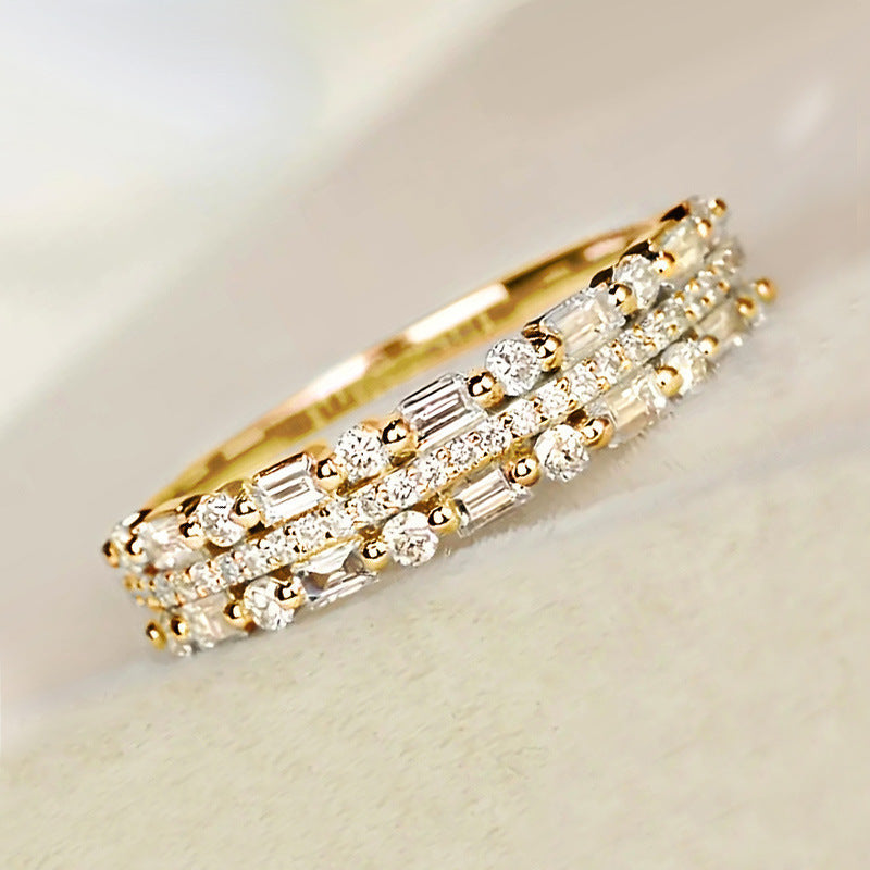 Gold three row diamond ring with round and baguette stones luxury minimalist jewelry online