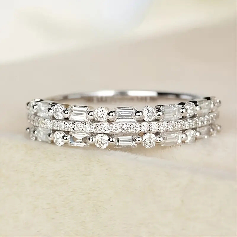 White gold diamond stacking ring set with baguette and round stones by lxm creatives luxury minimalist jewelry online